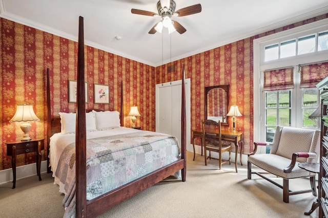 carpeted bedroom with wallpapered walls, ornamental molding, and multiple windows