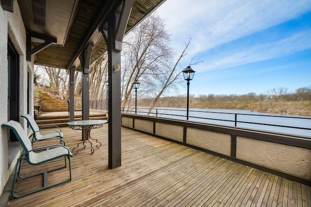 deck featuring a water view