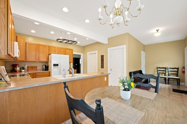 dining room featuring recessed lighting, baseboards, light tile patterned floors, and an inviting chandelier