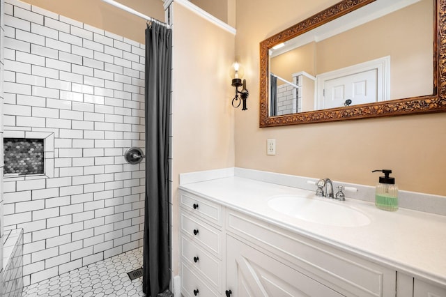 full bath with a shower stall and vanity