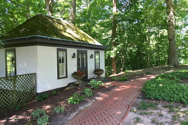 view of home's exterior with stucco siding