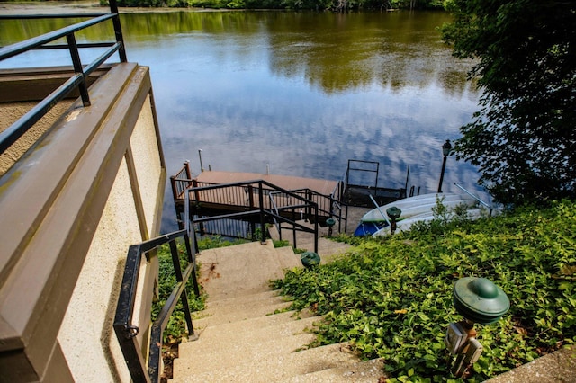 view of dock with a water view