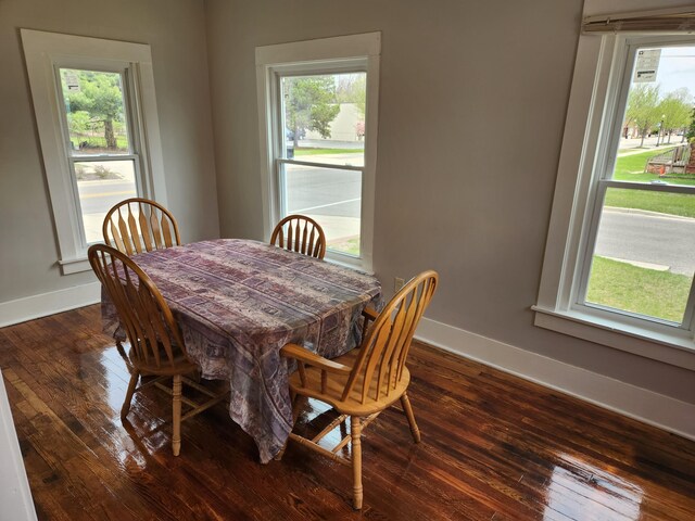 36707 Goddard Rd, Romulus, MI 48174 - dining space with a healthy amount of sunlight, baseboards, and dark wood-style flooring