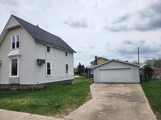 36707 Goddard Rd, Romulus, MI 48174 - view of property exterior featuring a shingled roof, a detached garage, a wall unit AC, an outdoor structure, and a yard