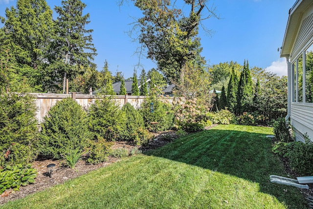 view of yard featuring fence