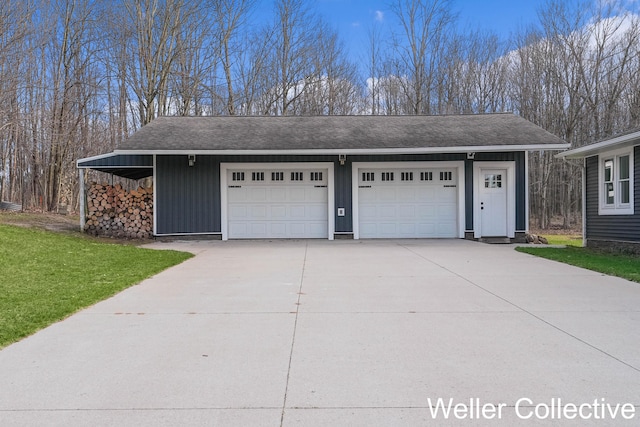 9090 E 32nd Rd, Cadillac, MI 49601 - garage featuring driveway