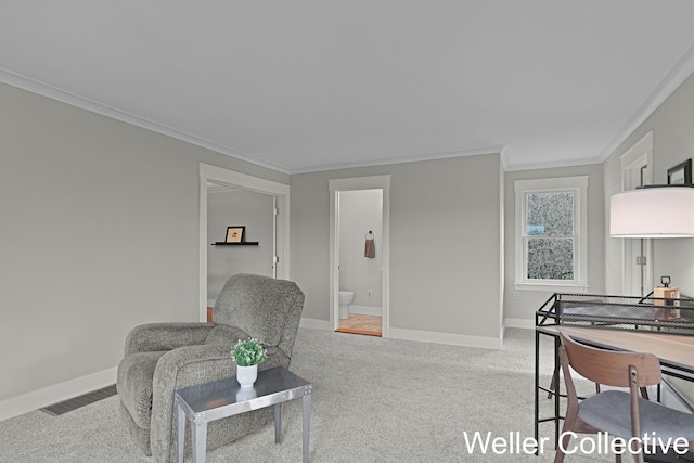 9090 E 32nd Rd, Cadillac, MI 49601 - sitting room with crown molding, baseboards, visible vents, and carpet