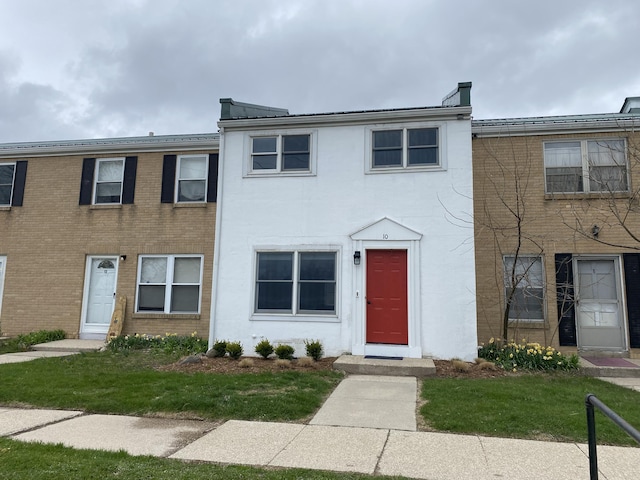 10 Meadow Hills Ln, Fremont, MI 49412 - view of property featuring brick siding