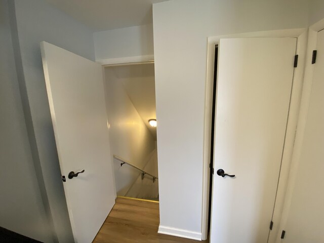 10 Meadow Hills Ln, Fremont, MI 49412 - stairs featuring wood finished floors