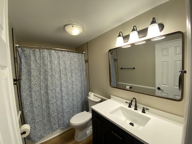 10 Meadow Hills Ln, Fremont, MI 49412 - bathroom with toilet, vanity, and curtained shower