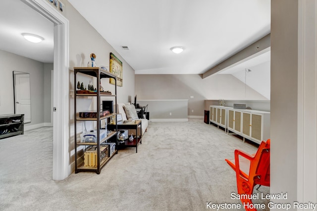 430 Union Ave NE Unit 303, Grand Rapids, MI 49503 - interior space featuring baseboards, vaulted ceiling, and carpet