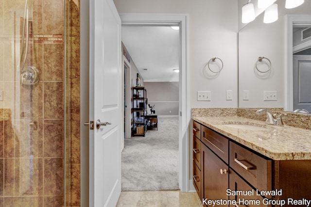 430 Union Ave NE Unit 303, Grand Rapids, MI 49503 - full bath featuring tile patterned flooring, vanity, and tiled shower