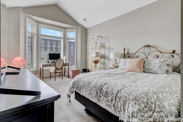 430 Union Ave NE Unit 303, Grand Rapids, MI 49503 - carpeted bedroom featuring lofted ceiling and visible vents