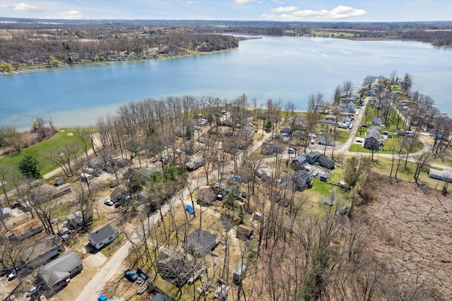 birds eye view of property featuring a residential view and a water view