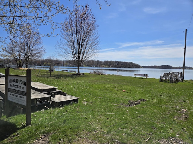 view of yard with a water view