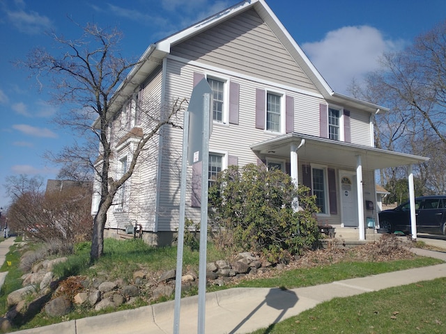101 N Lewis St, Saline, MI 48176 - view of front of property featuring a porch