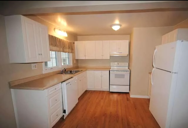 101 N Lewis St, Saline, MI 48176 - kitchen with white cabinets, a sink, light wood-type flooring, white appliances, and light countertops