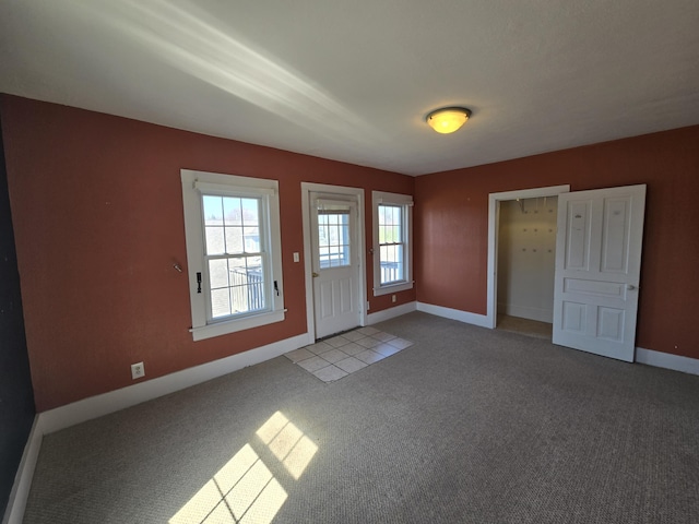 101 N Lewis St, Saline, MI 48176 - entrance foyer with baseboards and carpet floors
