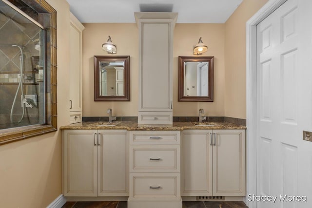 7174 Loma Linda Dr, Rockford, MI 49341 - bathroom with double vanity and a tile shower