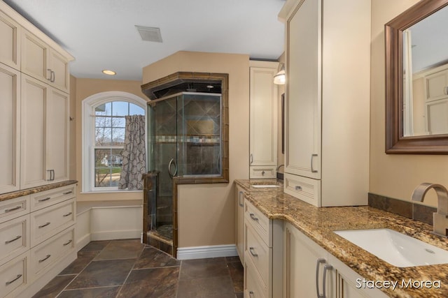 7174 Loma Linda Dr, Rockford, MI 49341 - bathroom with a stall shower, baseboards, vanity, and recessed lighting