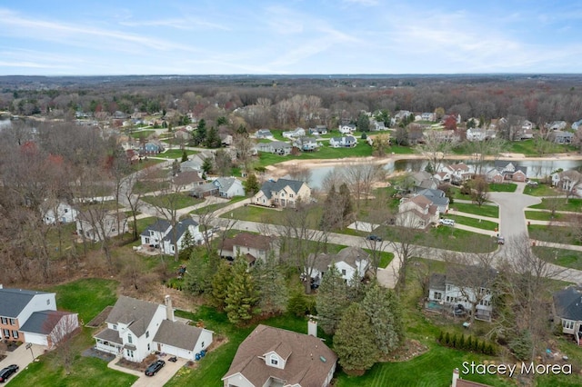 7174 Loma Linda Dr, Rockford, MI 49341 - aerial view of property and surrounding area with nearby suburban area and a large body of water