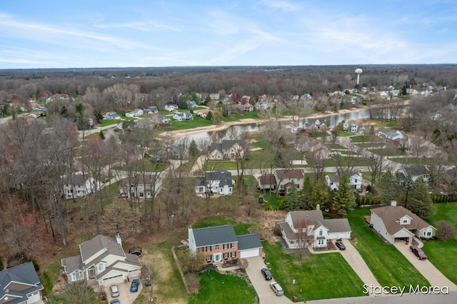 7174 Loma Linda Dr, Rockford, MI 49341 - aerial view of property and surrounding area featuring nearby suburban area and a nearby body of water