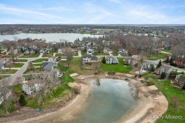 7174 Loma Linda Dr, Rockford, MI 49341 - aerial view of property's location with a nearby body of water and nearby suburban area