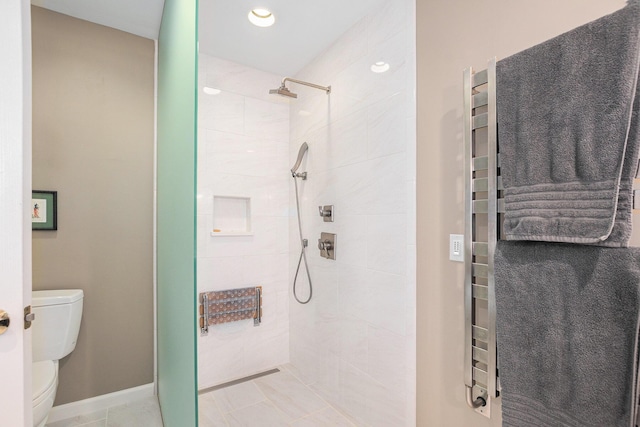 565 Hawksnest Dr, South Haven, MI 49090 - bathroom featuring toilet, a shower stall, a towel warming rack, and recessed lighting