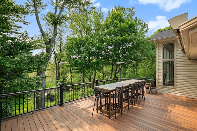 565 Hawksnest Dr, South Haven, MI 49090 - wooden deck featuring outdoor dining space