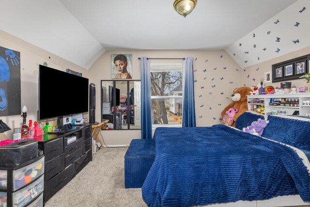 442 Emerald Ave NE, Grand Rapids, MI 49503 - bedroom with vaulted ceiling and carpet flooring