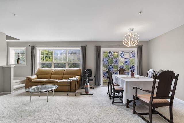 2777 Barclay Way, Ann Arbor, MI 48105 - dining space with carpet floors, a chandelier, and plenty of natural light