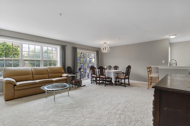 2777 Barclay Way, Ann Arbor, MI 48105 - living area featuring carpet flooring and a chandelier