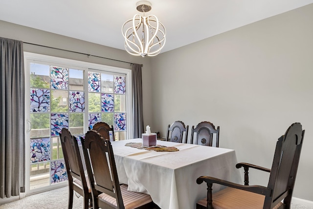2777 Barclay Way, Ann Arbor, MI 48105 - carpeted dining room featuring a chandelier and baseboards