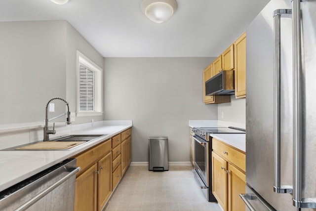 2777 Barclay Way, Ann Arbor, MI 48105 - kitchen with stainless steel appliances, light countertops, and light floors