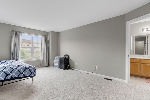 2777 Barclay Way, Ann Arbor, MI 48105 - bedroom featuring light carpet and ensuite bath