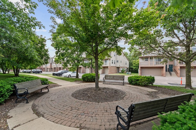 2777 Barclay Way, Ann Arbor, MI 48105 - view of home's community with a residential view, curved driveway, and an attached garage