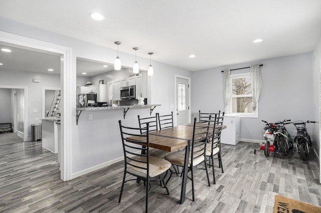 145 Kingsbury St, Athens, MI 49011 - dining area with wood finished floors, recessed lighting, and baseboards