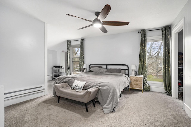 145 Kingsbury St, Athens, MI 49011 - carpeted bedroom with a baseboard heating unit, multiple windows, and ceiling fan