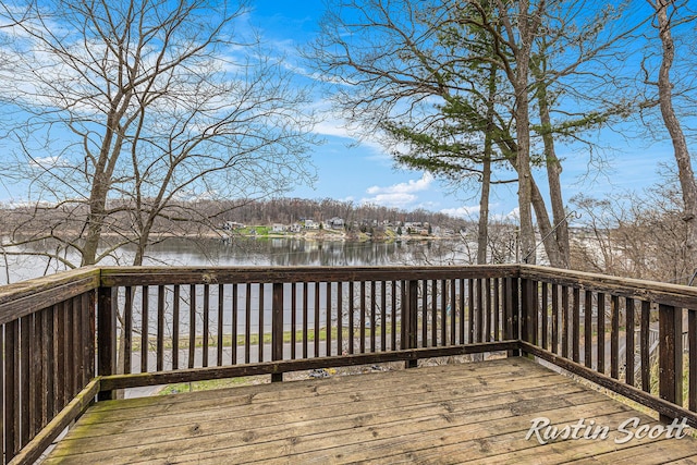 7229 Bordeau Dr NE, Belding, MI 48809 - wooden terrace featuring a water view