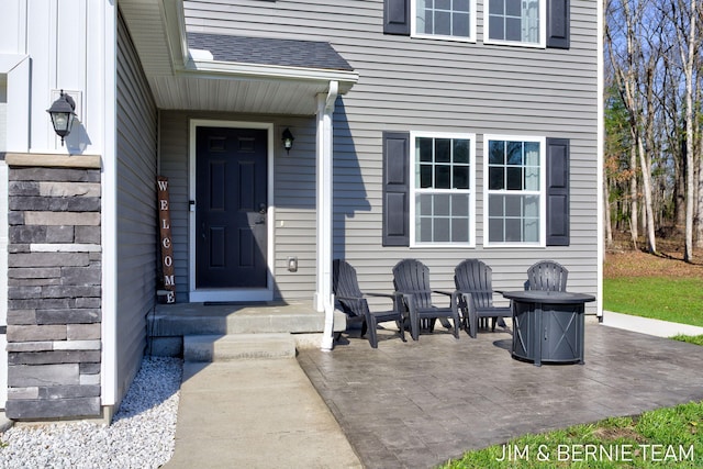 property entrance featuring a patio