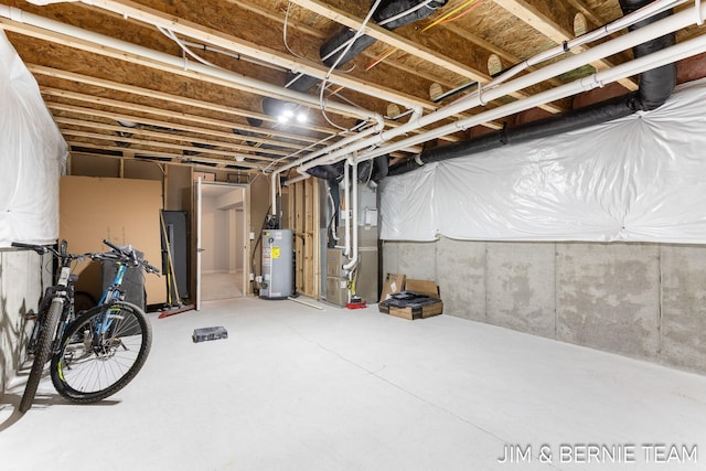 unfinished below grade area with heating unit and water heater