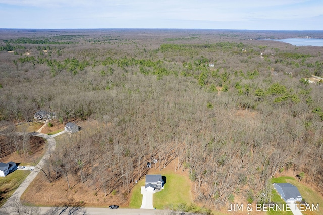 aerial view featuring a view of trees