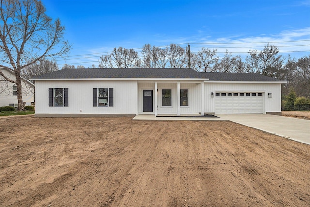 3574 Valley View Dr, Muskegon, MI 49444 - single story home with a garage, driveway, covered porch, and roof with shingles