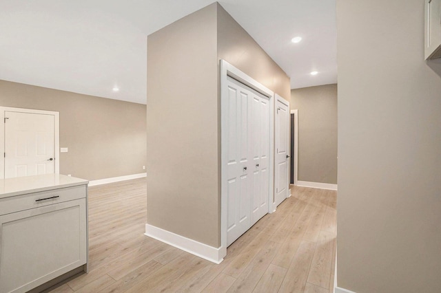 3574 Valley View Dr, Muskegon, MI 49444 - corridor with baseboards, light wood-style floors, and recessed lighting