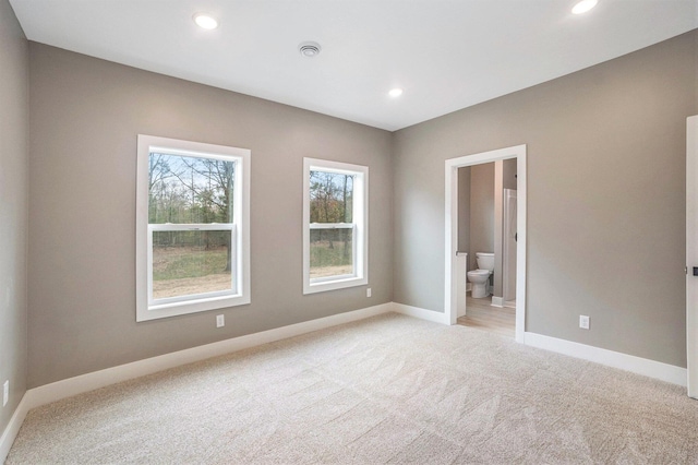 3574 Valley View Dr, Muskegon, MI 49444 - empty room with light carpet, baseboards, and recessed lighting