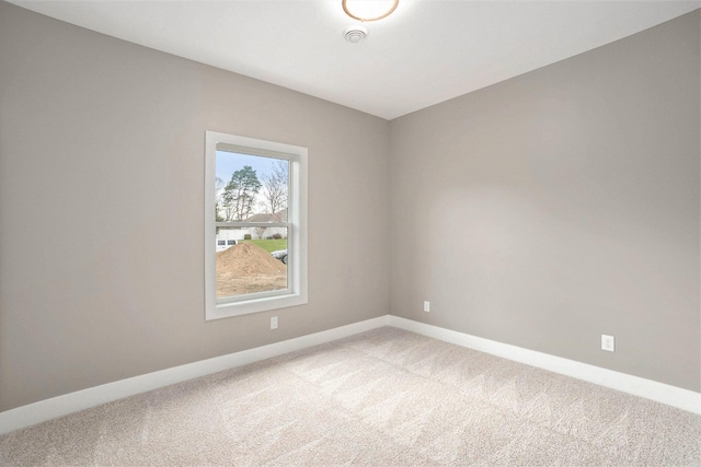 3574 Valley View Dr, Muskegon, MI 49444 - spare room with light carpet and baseboards