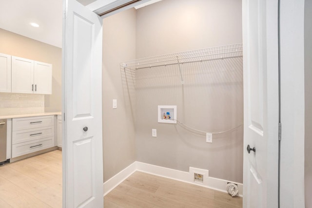 3574 Valley View Dr, Muskegon, MI 49444 - laundry area featuring hookup for a washing machine, light wood finished floors, baseboards, and recessed lighting