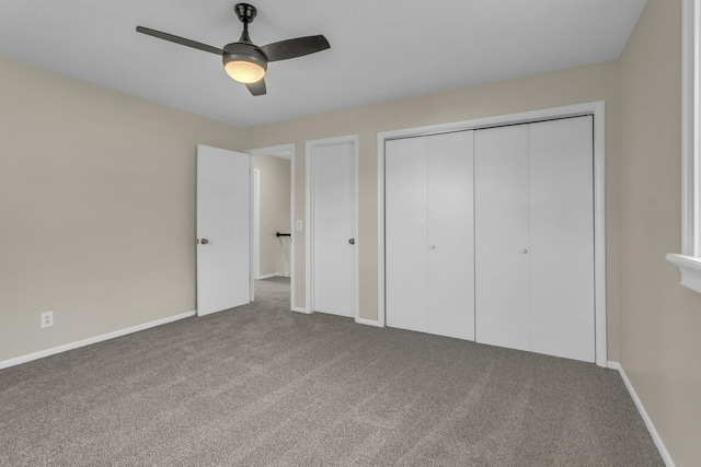 9315 Kingsley Dr, Onsted, MI 49265 - unfurnished bedroom featuring carpet, a closet, ceiling fan, and baseboards