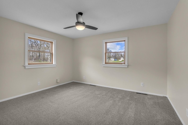 9315 Kingsley Dr, Onsted, MI 49265 - carpeted spare room featuring baseboards and a ceiling fan