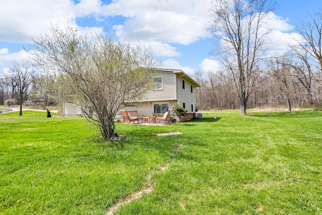 9315 Kingsley Dr, Onsted, MI 49265 - view of grassy yard with a patio area